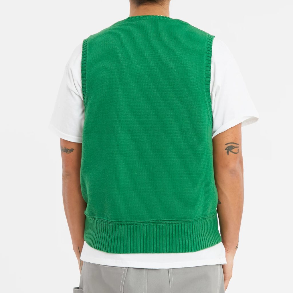 green sweater vest