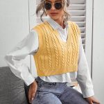yellow sweater vest