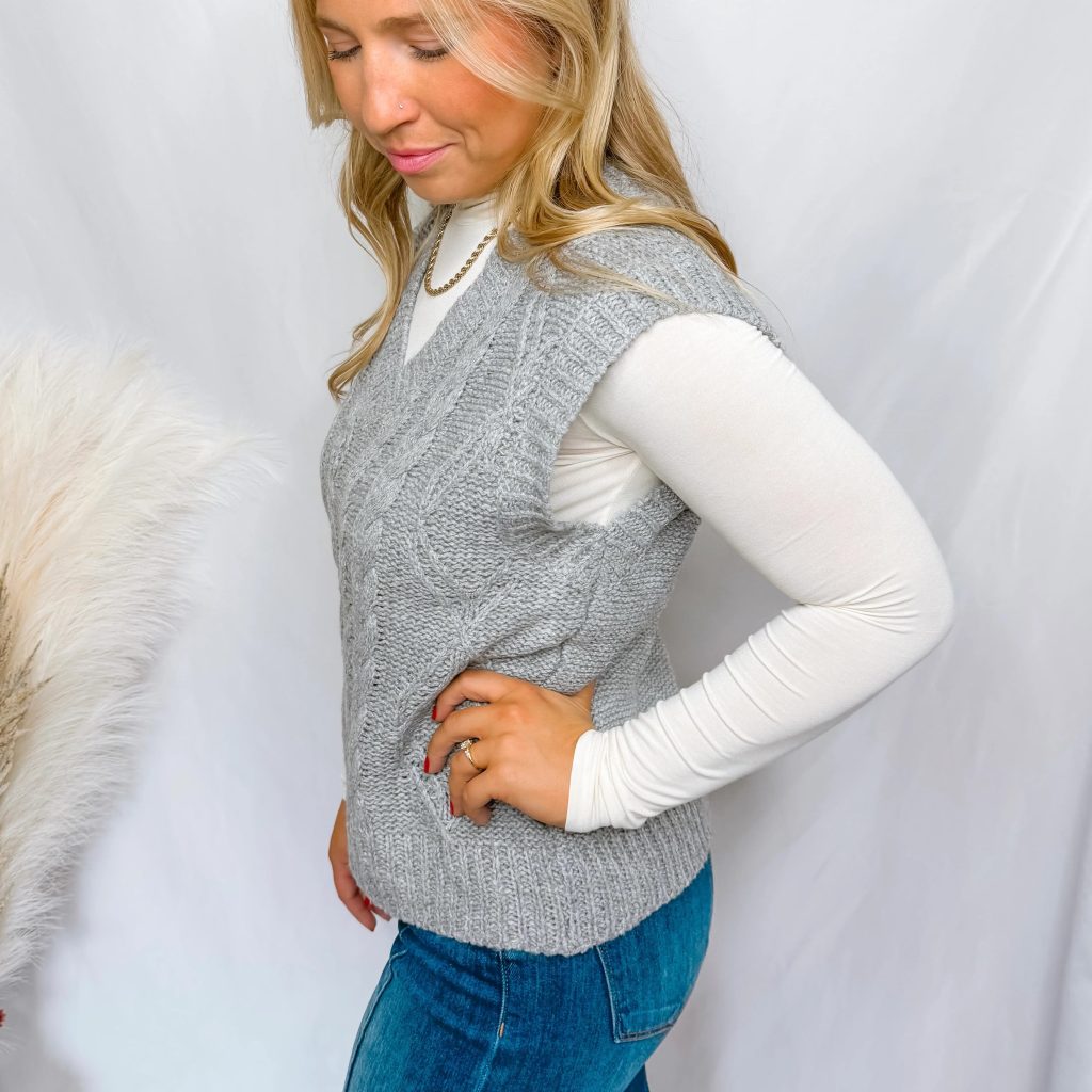 gray sweater vest