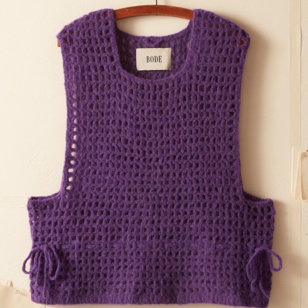 purple sweater vest