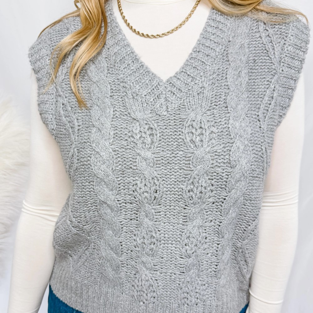 gray sweater vest